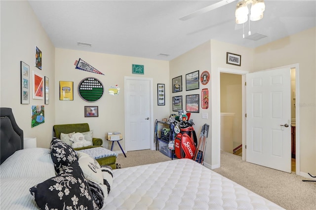 carpeted bedroom with ceiling fan