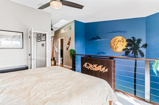 bedroom with lofted ceiling and ceiling fan