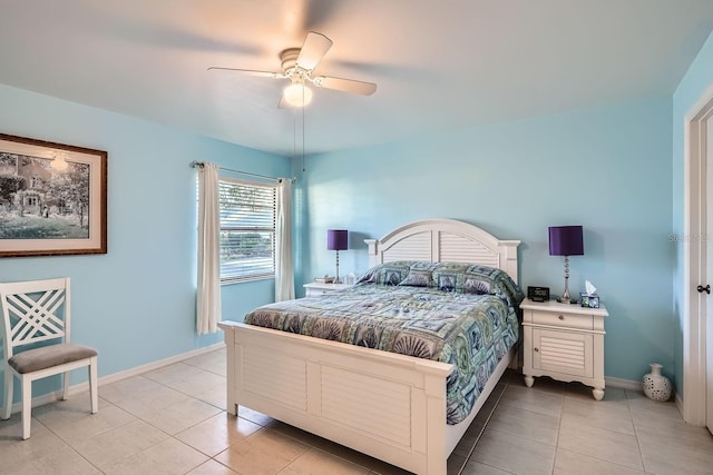 bedroom featuring light tile patterned flooring and ceiling fan