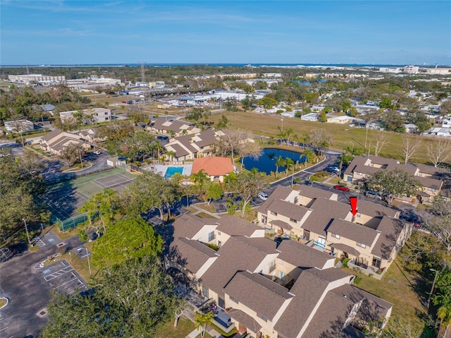 aerial view with a residential view and a water view