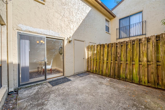 view of patio with fence