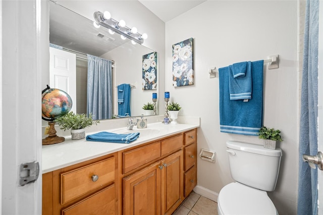 bathroom with toilet, a shower with shower curtain, vanity, visible vents, and tile patterned floors