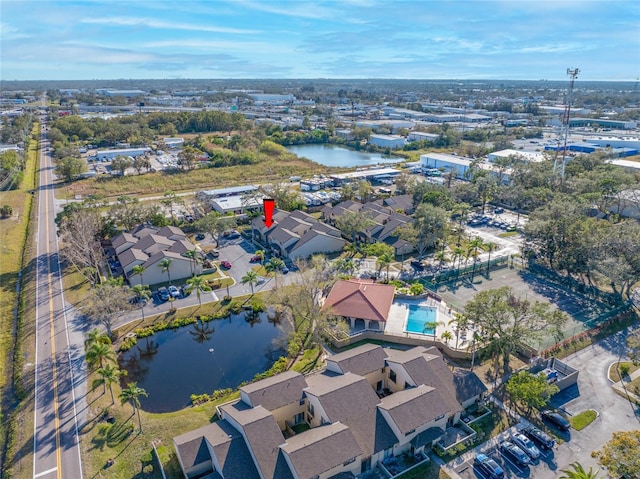 bird's eye view with a water view and a residential view