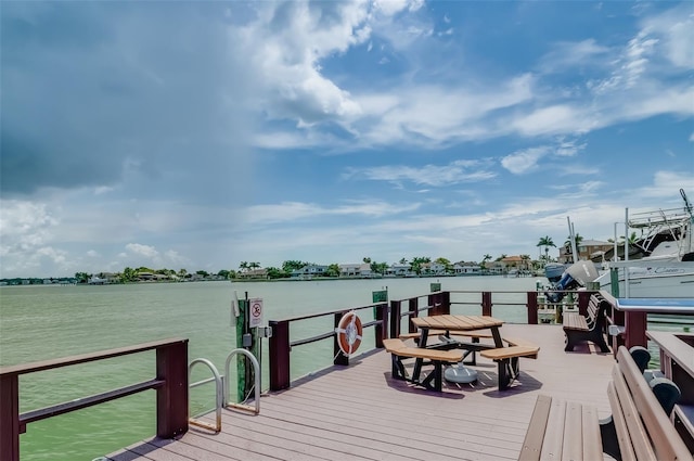 dock area featuring a water view