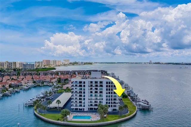 birds eye view of property featuring a water view