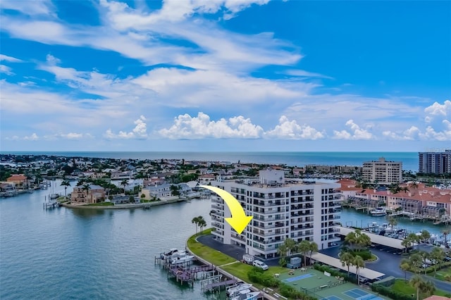 birds eye view of property with a water view