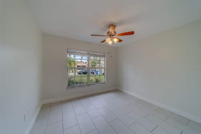 spare room featuring ceiling fan