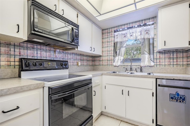 kitchen with tasteful backsplash, white cabinetry, sink, stainless steel dishwasher, and electric stove