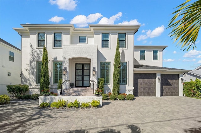 view of front of property with a garage