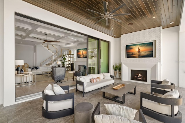 exterior space featuring coffered ceiling, wood ceiling, ornamental molding, beamed ceiling, and ceiling fan