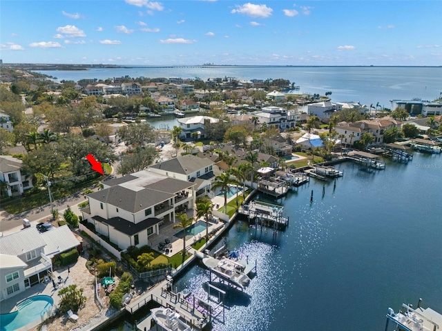 drone / aerial view featuring a water view