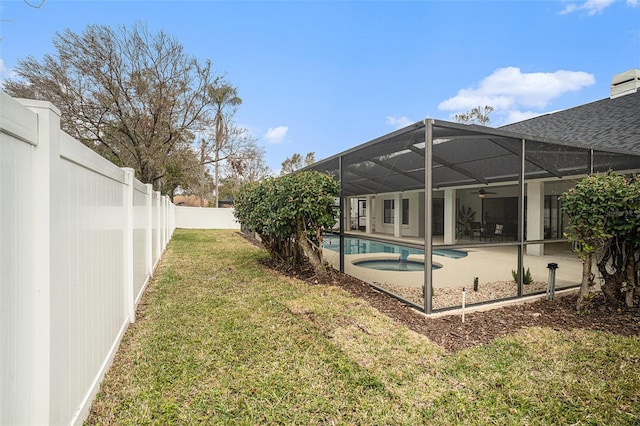 view of yard with a fenced in pool and a patio area