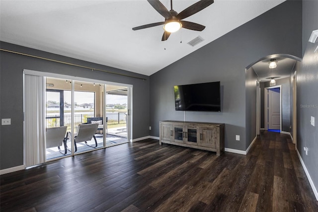 unfurnished living room with vaulted ceiling, ceiling fan, and dark hardwood / wood-style flooring