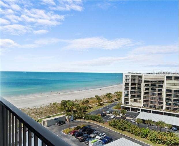 view of water feature with a beach view