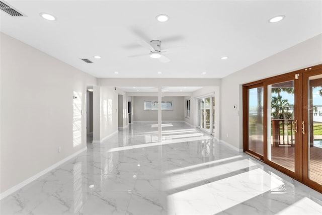 unfurnished room featuring visible vents, baseboards, marble finish floor, french doors, and recessed lighting