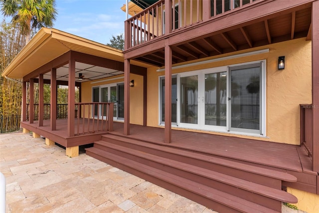316 Shore Dr E, Oldsmar, FL 34677 - deck with french doors, a ceiling fan, and a patio