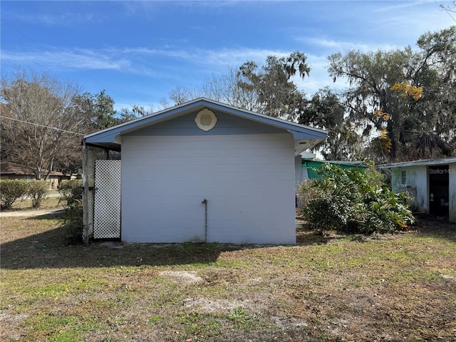 view of home's exterior featuring a yard