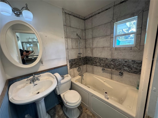 bathroom featuring sink and toilet