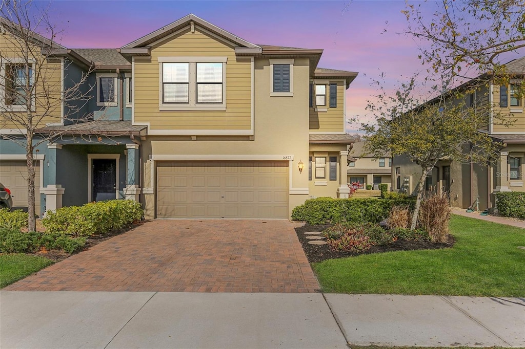 view of front of home with a garage