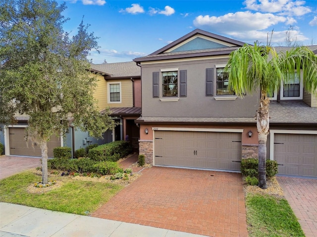 view of front of property with a garage