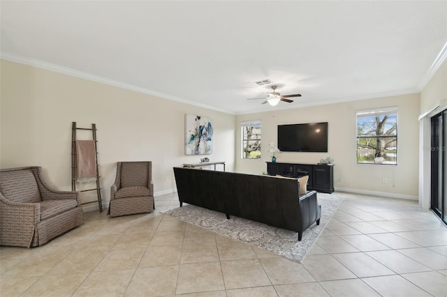 living room with ceiling fan, ornamental molding, and light tile patterned floors