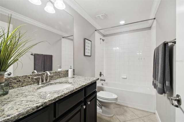 full bathroom featuring toilet, crown molding, vanity, tiled shower / bath combo, and tile patterned flooring