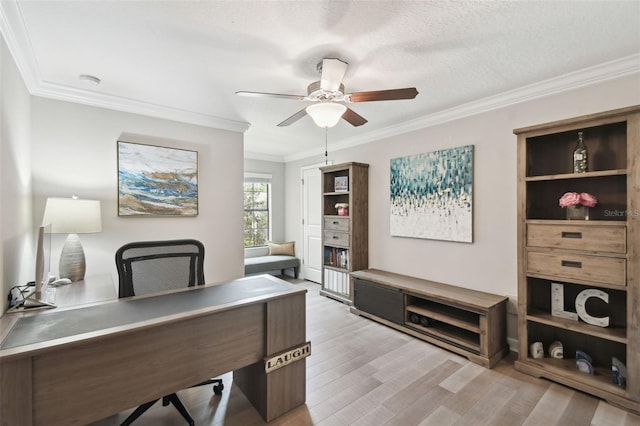 office space with crown molding, ceiling fan, a textured ceiling, and light wood-type flooring