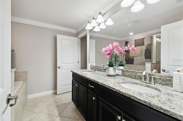 bathroom featuring tile patterned floors, ornamental molding, vanity, and tiled tub