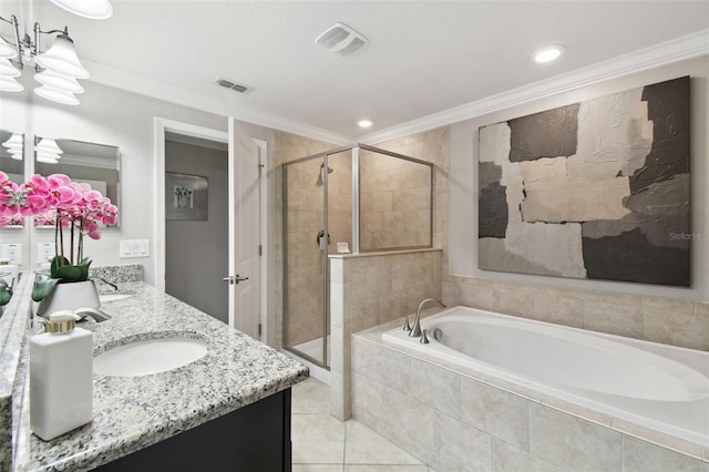 bathroom featuring independent shower and bath, vanity, ornamental molding, and tile patterned flooring