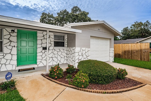 property entrance featuring a garage