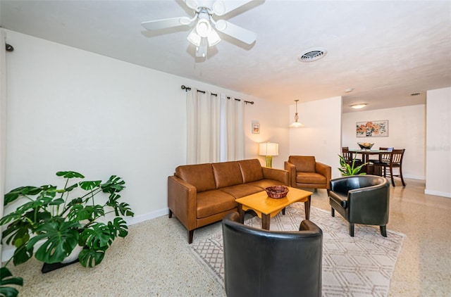 living room with ceiling fan