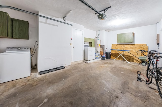 garage featuring independent washer and dryer, a garage door opener, and gas water heater