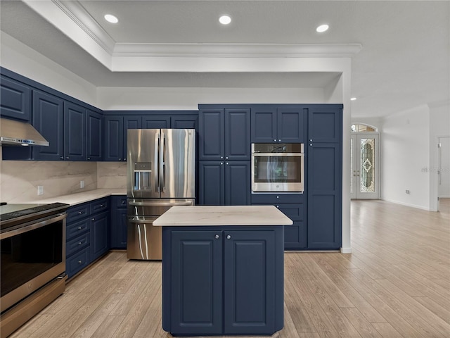 kitchen featuring crown molding, blue cabinetry, and appliances with stainless steel finishes