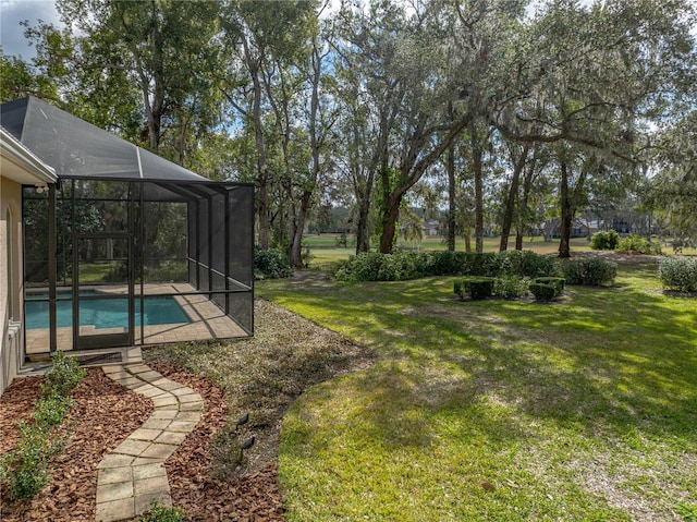 view of yard with a lanai