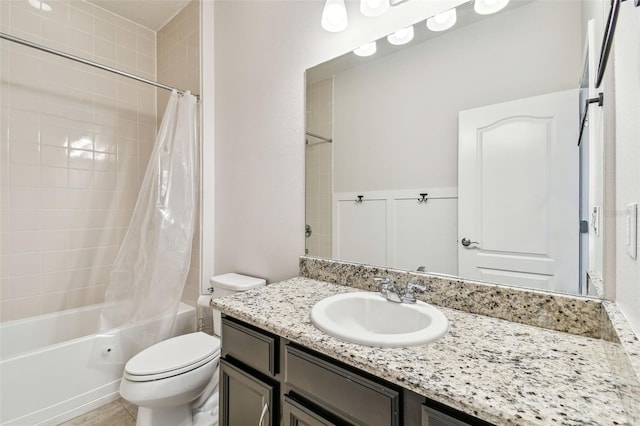 full bathroom featuring vanity, toilet, and shower / bath combo with shower curtain