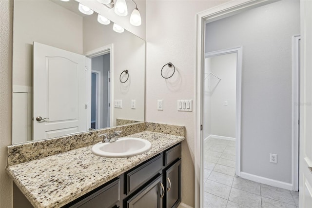 bathroom featuring vanity and tile patterned flooring