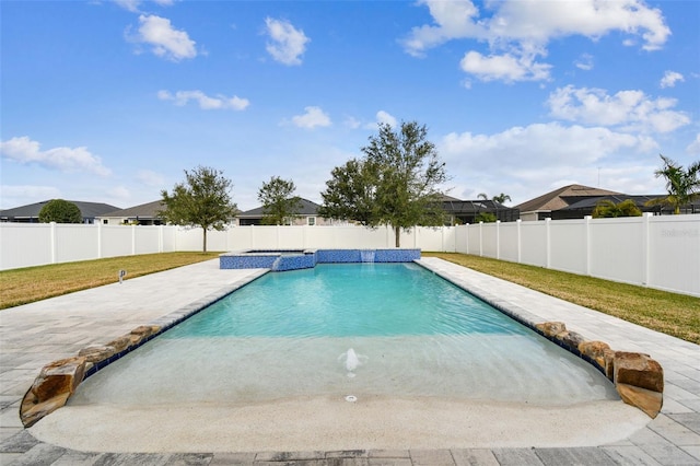 view of pool with a patio and pool water feature