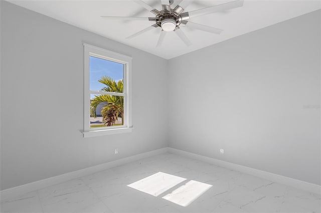 spare room featuring ceiling fan