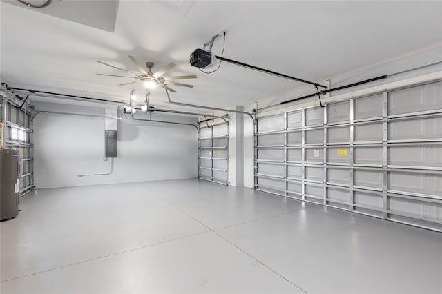 garage with a garage door opener, electric panel, water heater, and ceiling fan