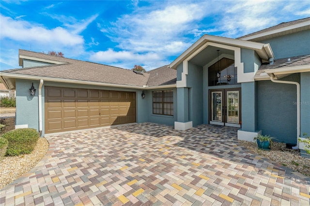 view of front of property with a garage