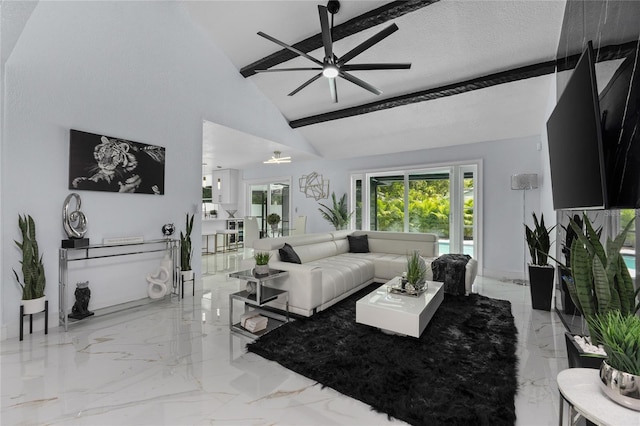 living room with ceiling fan, high vaulted ceiling, and a textured ceiling