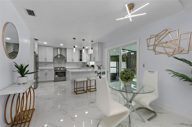 dining space with sink