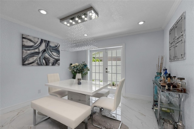 dining room featuring crown molding, a textured ceiling, and french doors