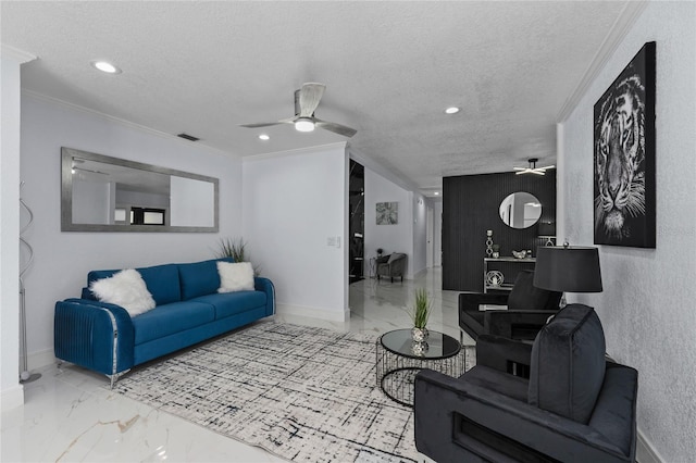 living room with ceiling fan, crown molding, and a textured ceiling