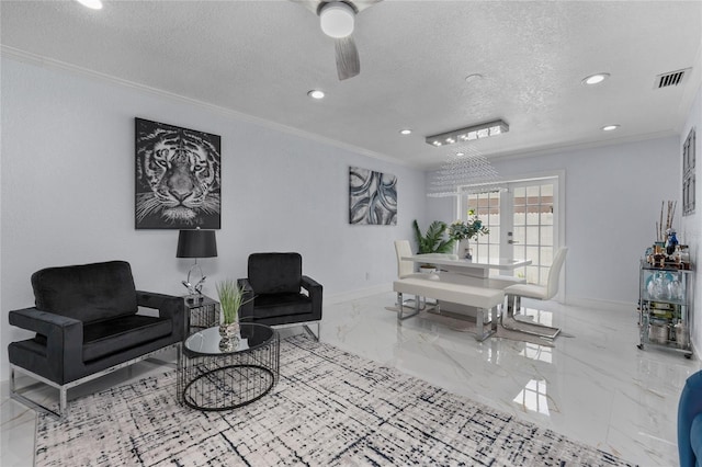 interior space with crown molding, ceiling fan, a textured ceiling, and french doors