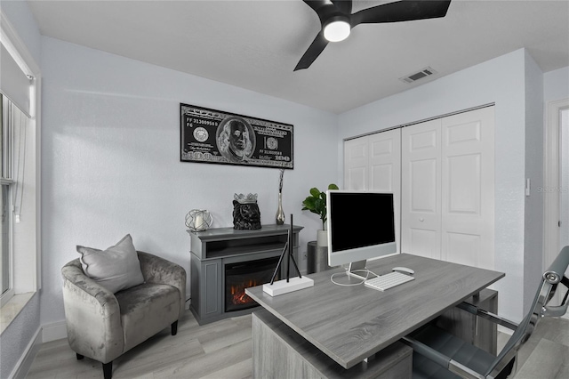 office area featuring ceiling fan and light wood-type flooring