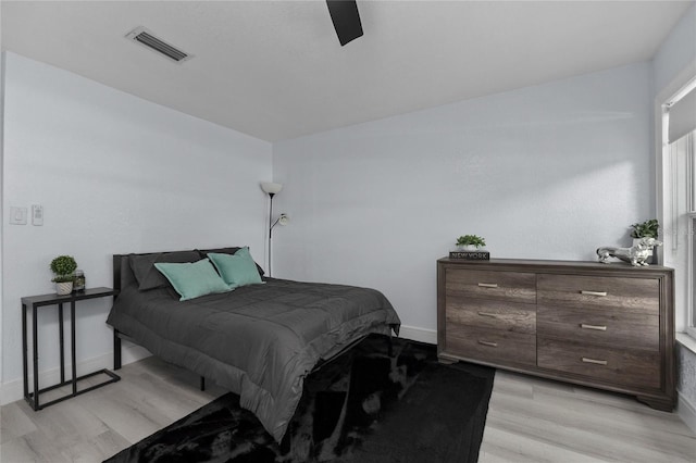 bedroom featuring ceiling fan and light wood-type flooring