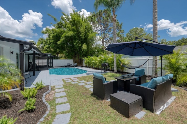 view of swimming pool with a patio area and a lawn