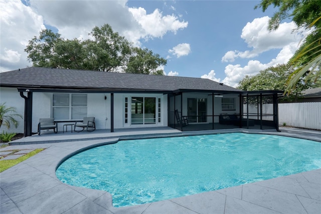 view of swimming pool with a patio