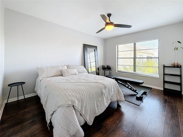 bedroom featuring ceiling fan and dark hardwood / wood-style flooring